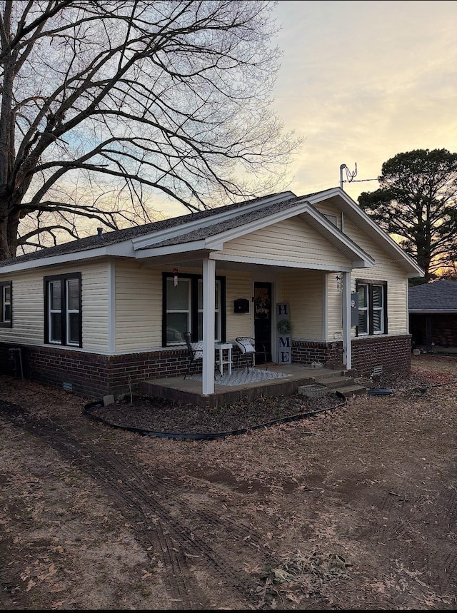 view of front of home featuring covered porch