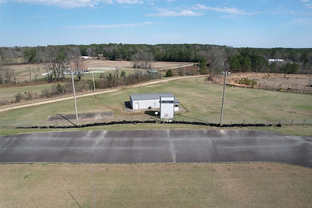 birds eye view of property featuring a rural view