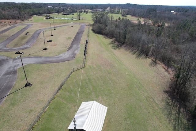 birds eye view of property featuring a rural view