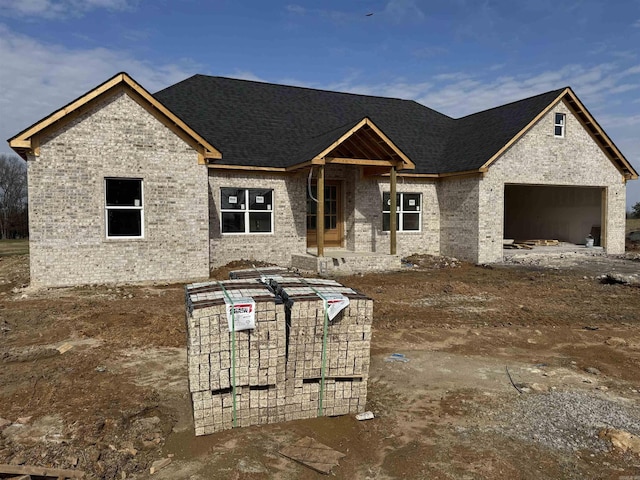 property under construction featuring a garage