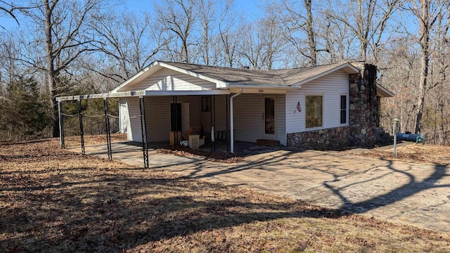 view of front of home with a carport