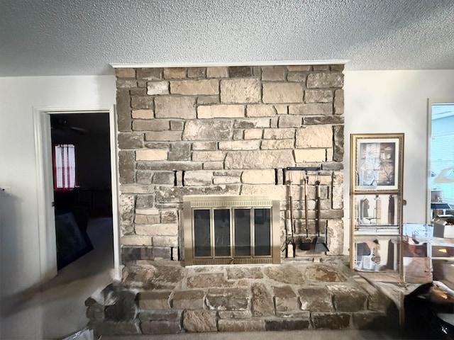 room details with a fireplace and a textured ceiling