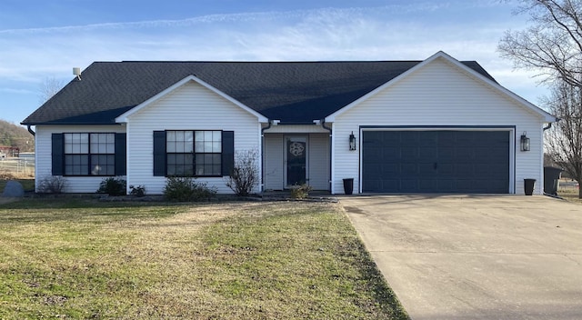 single story home featuring a garage and a front lawn