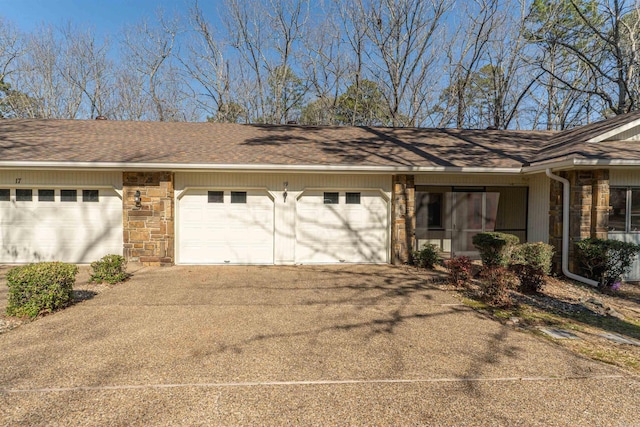 view of side of property with a garage