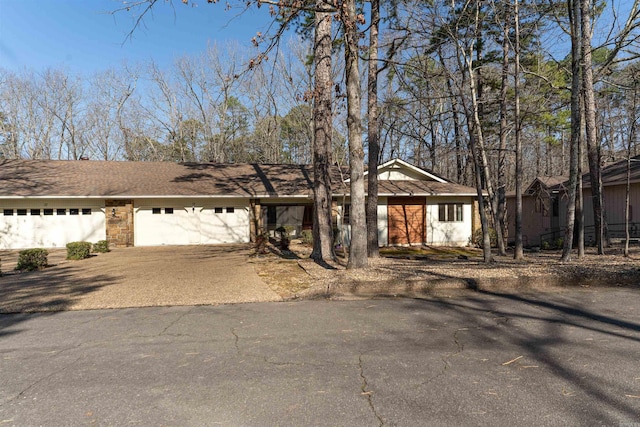 single story home with a garage