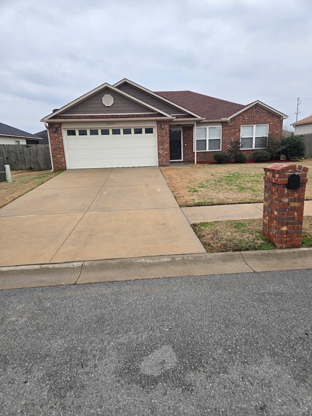 single story home featuring a garage