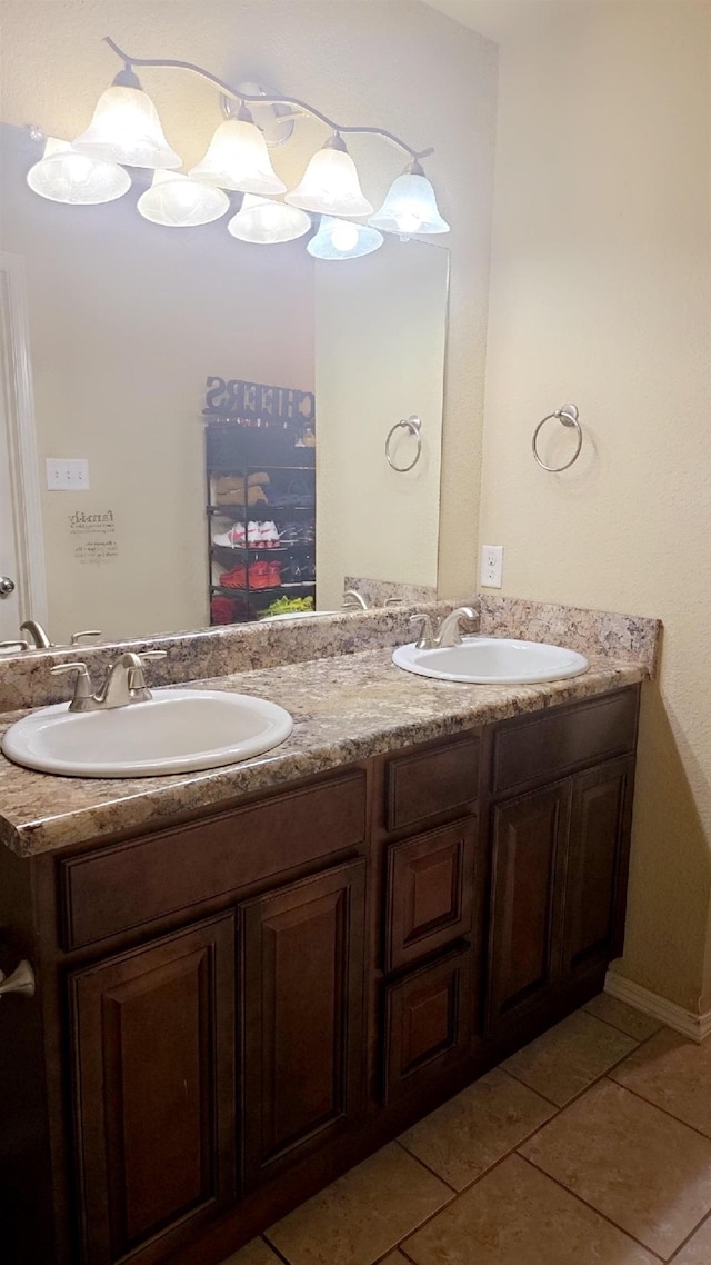 bathroom featuring tile patterned floors and vanity