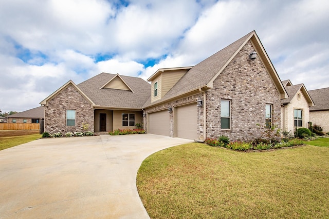 craftsman-style home with a garage and a front lawn