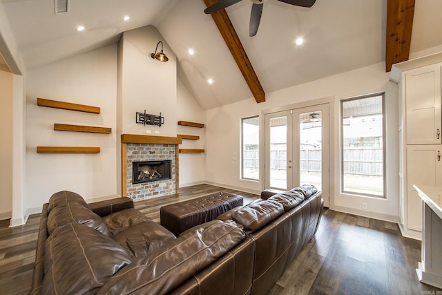 living room featuring dark hardwood / wood-style floors, a fireplace, high vaulted ceiling, beamed ceiling, and french doors