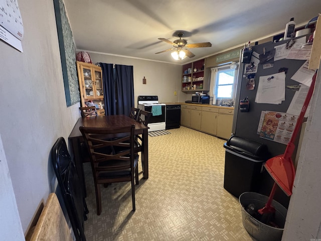 kitchen with ornamental molding, sink, ceiling fan, and black appliances