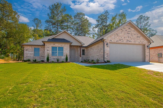 view of front facade with a garage and a front lawn