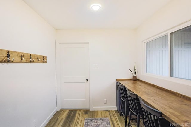 office space with hardwood / wood-style flooring