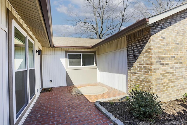 doorway to property featuring a patio