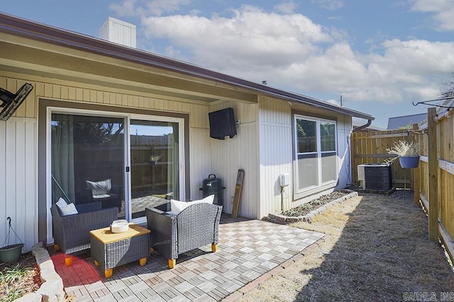 view of patio / terrace with cooling unit and an outdoor living space