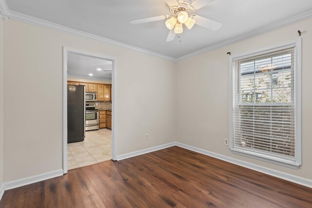 1601 N Bryant St Unit C27, Little Rock, AR 72207 - spare room featuring ornamental molding, ceiling fan, and light wood-type flooring