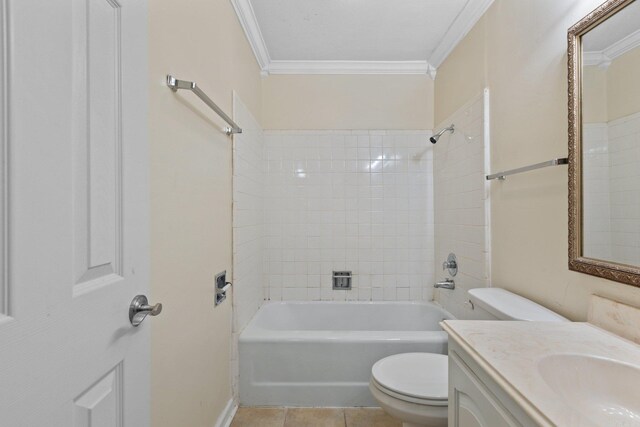 1601 N Bryant St Unit C27, Little Rock, AR 72207 - full bathroom featuring tiled shower / bath, tile patterned flooring, ornamental molding, vanity, and toilet