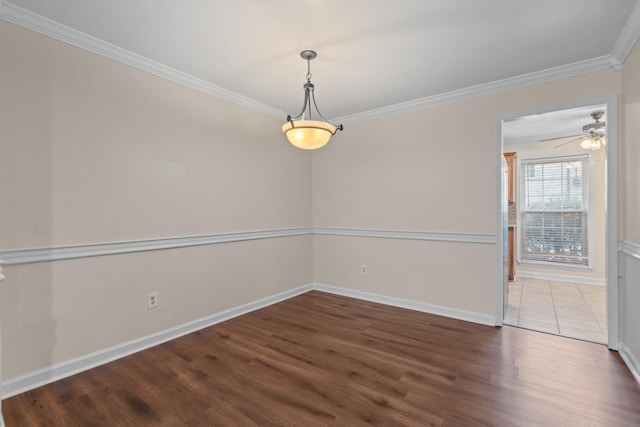 1601 N Bryant St Unit C27, Little Rock, AR 72207 - spare room featuring crown molding and hardwood / wood-style flooring