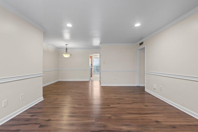 1601 N Bryant St Unit C27, Little Rock, AR 72207 - empty room featuring crown molding and dark hardwood / wood-style floors