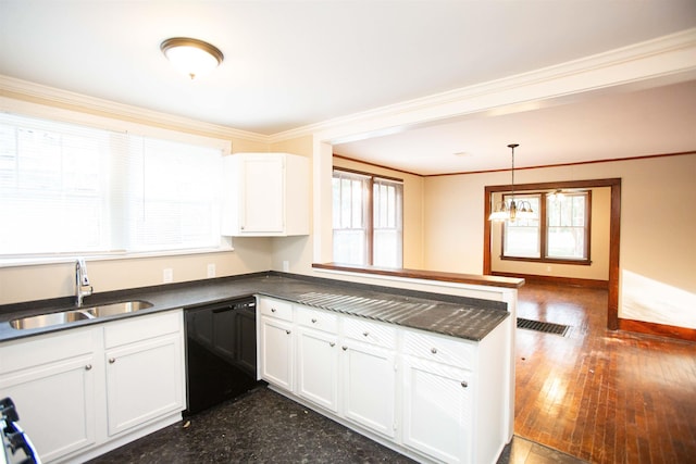 kitchen featuring sink, black dishwasher, kitchen peninsula, pendant lighting, and white cabinets