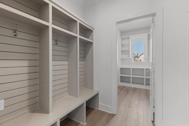 mudroom with light wood-style floors