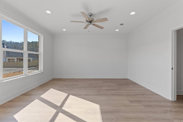 unfurnished room featuring light wood-style floors, recessed lighting, and baseboards