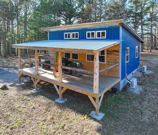 view of outbuilding with an outdoor living space