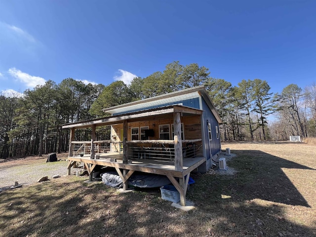 exterior space featuring a wooden deck