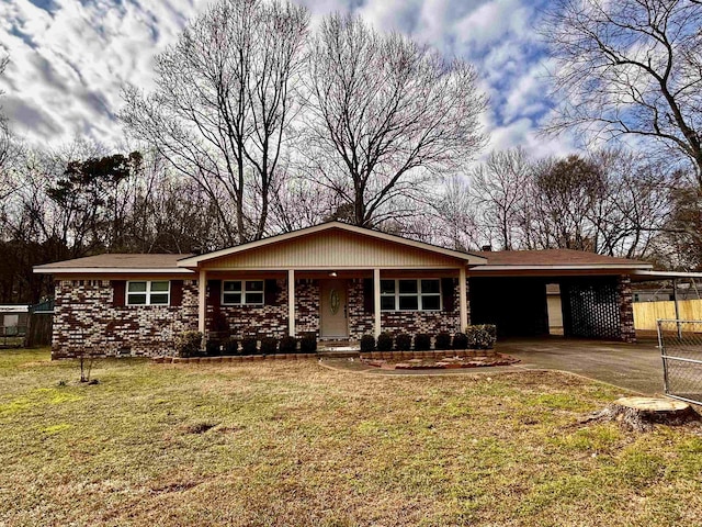 ranch-style house with a front lawn and a carport