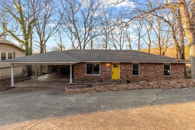 view of front facade with a carport