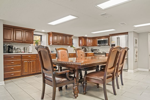 view of tiled dining space