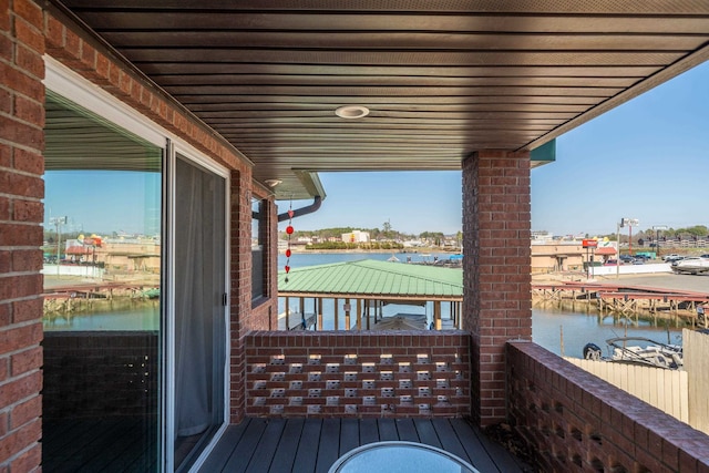 balcony featuring a water view