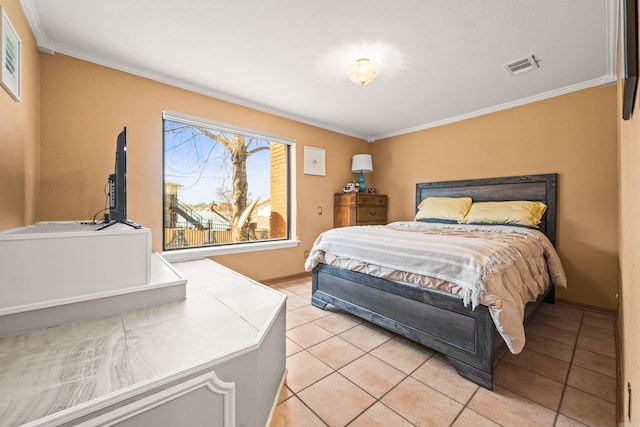 bedroom with light tile patterned floors and crown molding