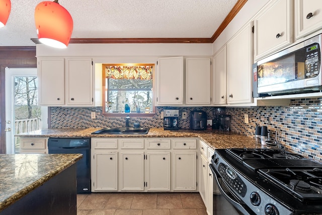 kitchen with white cabinetry, dishwasher, sink, and gas range oven