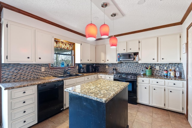 kitchen with a kitchen island, white cabinetry, sink, light stone counters, and black appliances