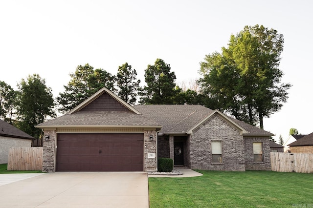 single story home with a garage and a front yard