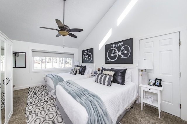 carpeted bedroom featuring ceiling fan and vaulted ceiling