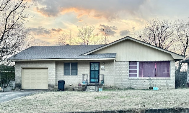 single story home with a garage