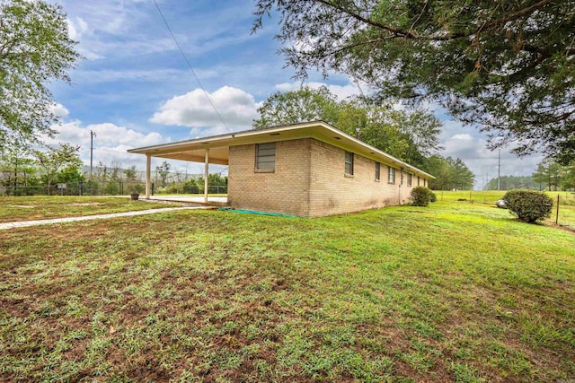 view of property exterior with a yard