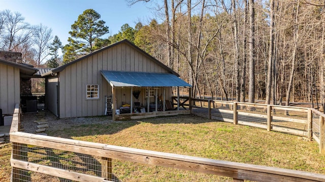 view of front of house with a front yard and covered porch