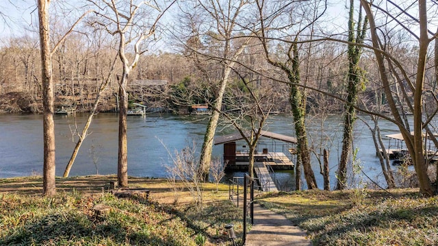 property view of water with a dock