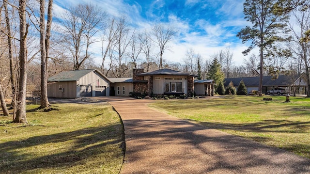 view of front of home with a front yard