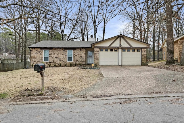 single story home featuring a garage