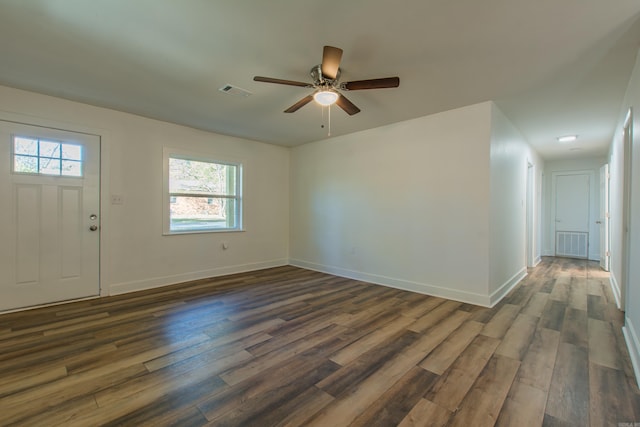 foyer entrance with dark hardwood / wood-style floors and ceiling fan