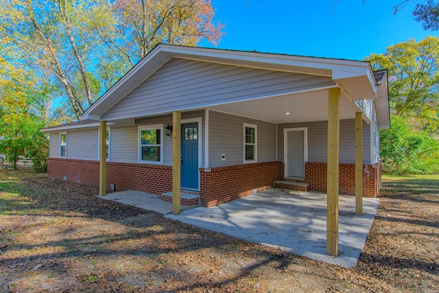 view of front of house with a carport