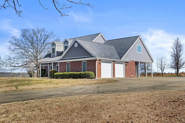 view of home's exterior with a garage and a yard