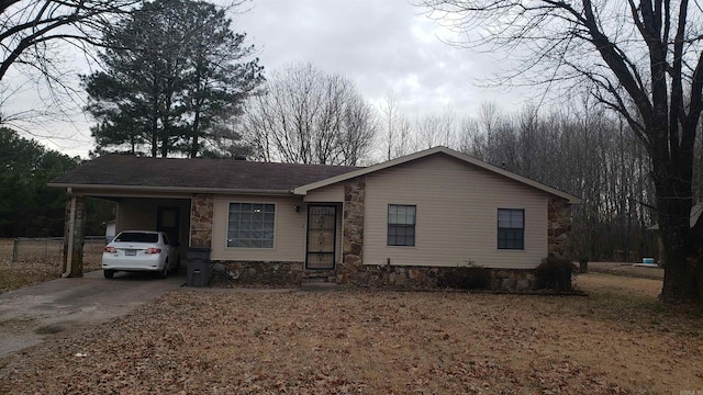 single story home with a carport