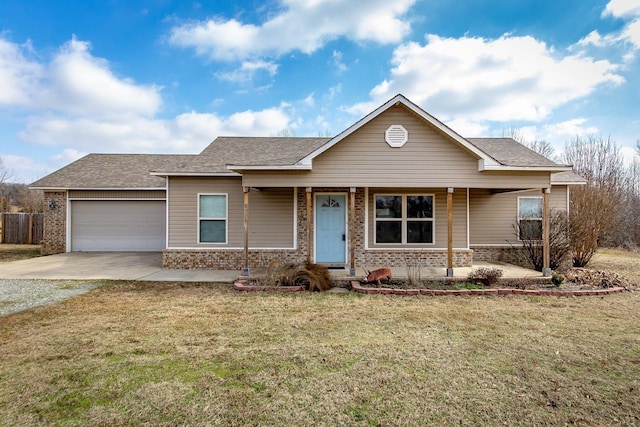 view of front of home featuring a garage and a front lawn