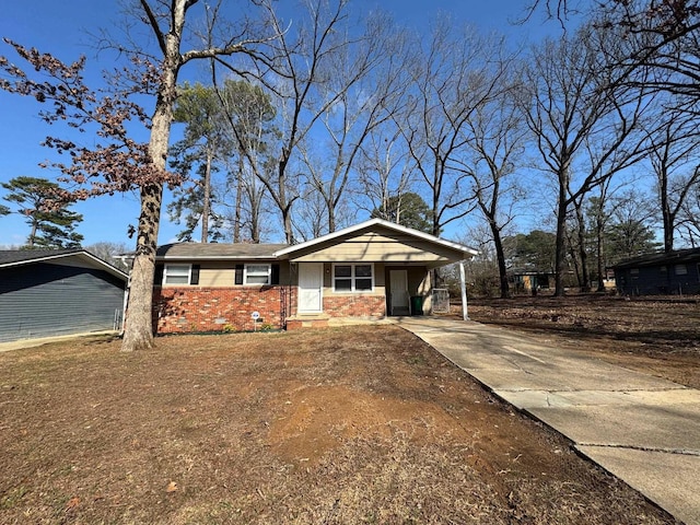 view of front of home featuring a carport