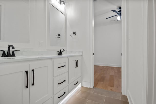 bathroom featuring vanity, tile patterned floors, and ceiling fan