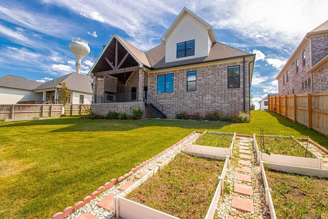 view of front of home with a front yard